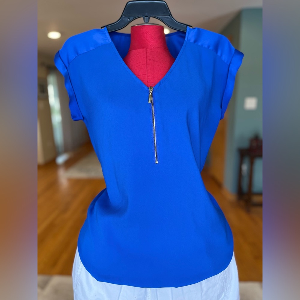 Express royal blue satiny zip-up blouse. No flaws. Fit Small-Medium